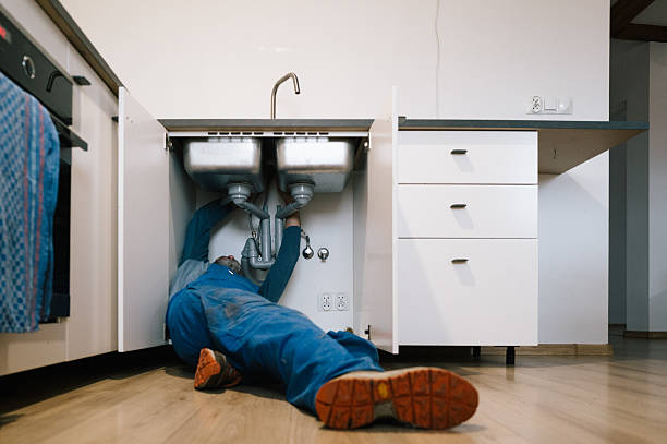 Professional Drain Cleaning technician working in Nicoma Park, OK